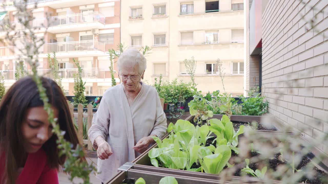 Elderly Woman Gardening with Caregiver