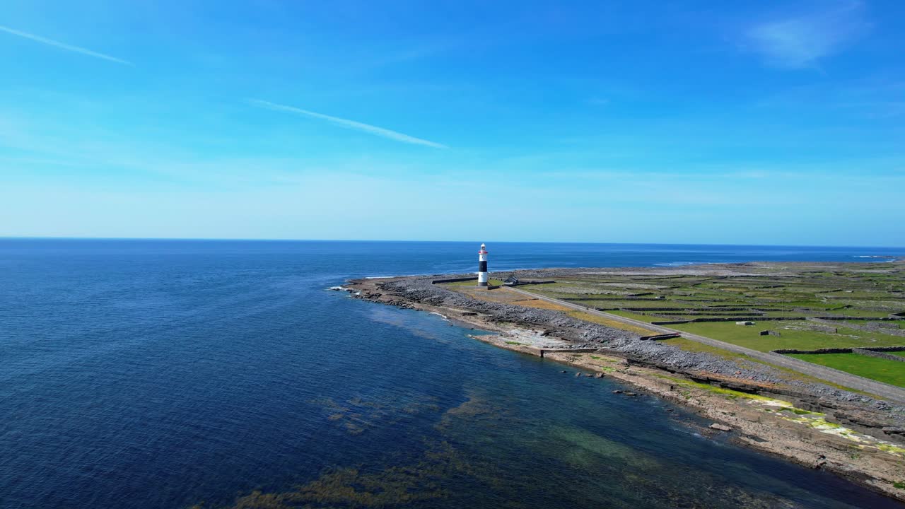 drone flying to lighthouse over rocky beach Inisheer Aran Islands wild Atlantic way Ireland epic locations
