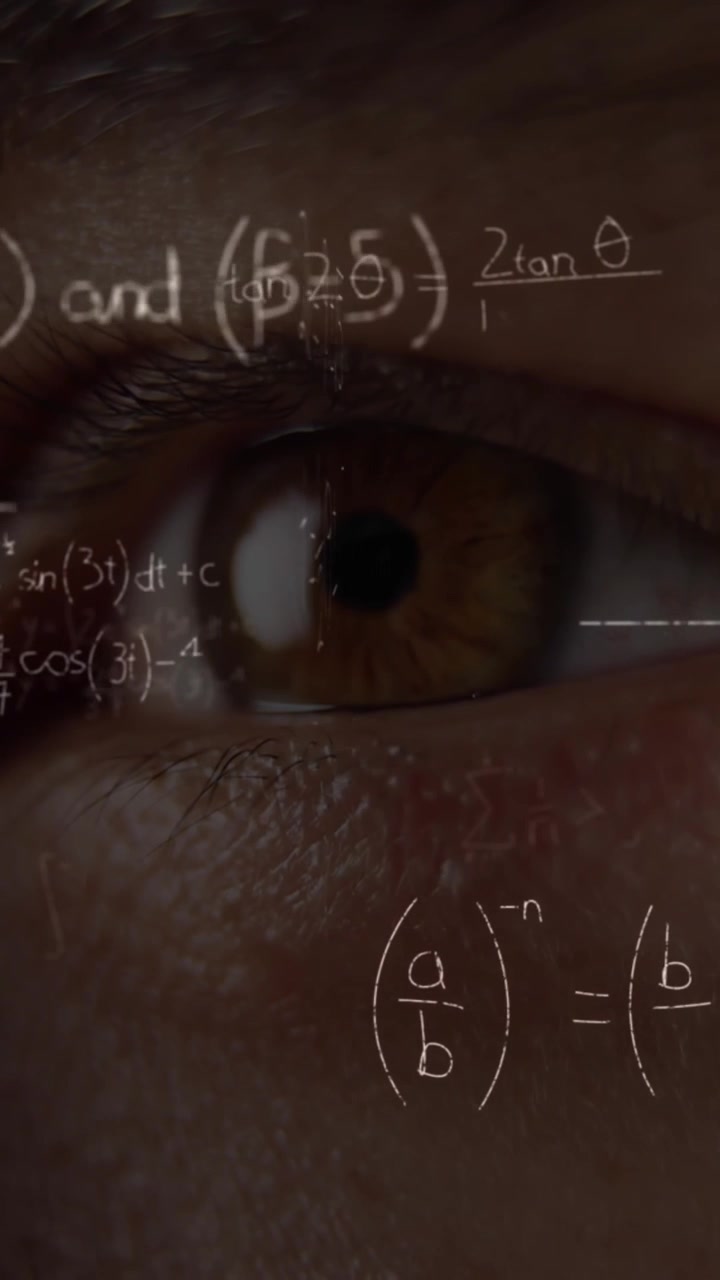Mand der blinker med øjnene over matematiske ligninger