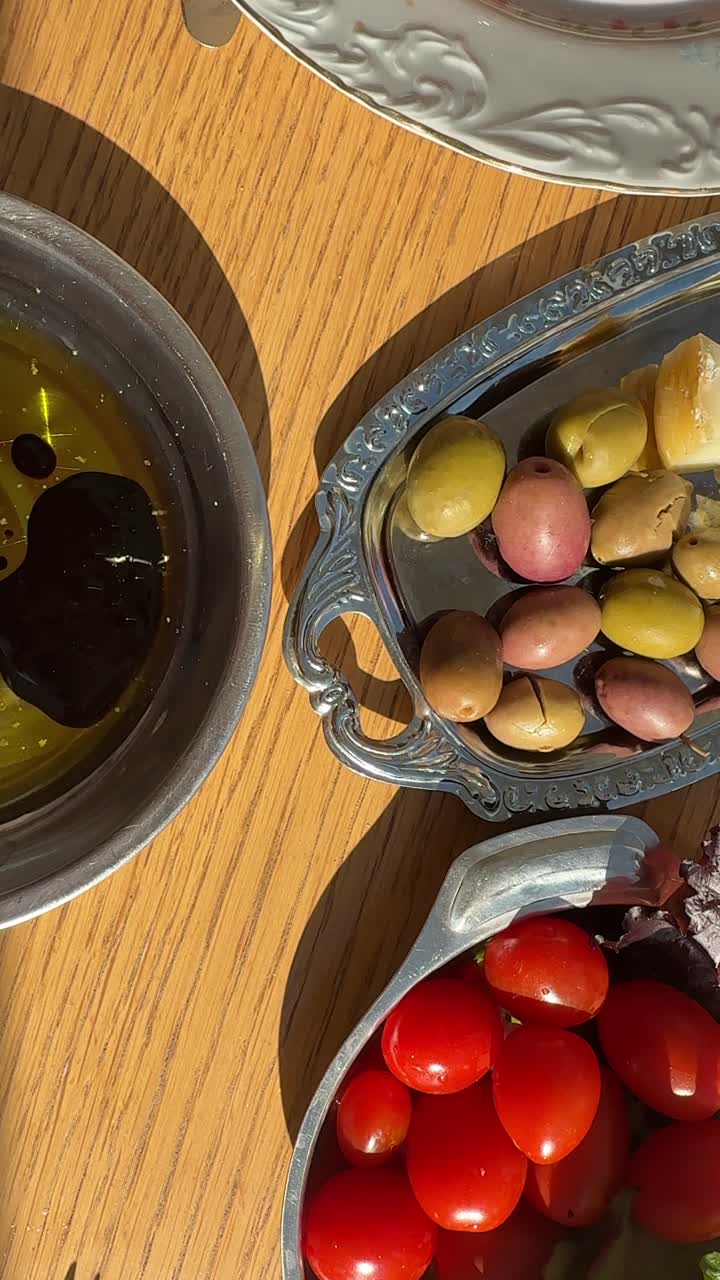 Olives, cheese, olive oil and balsamic appetizer