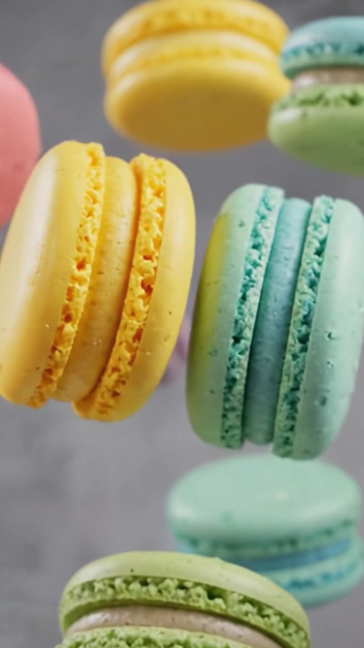 A Colorful Display of Delicate French Macarons in a Whimsical Arrangement, Highlighting Their Vibrant Palette and Delightful Texture