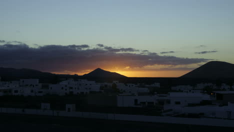 time lapse of sunset with clouds, mancha blanca village, canary islands, spain