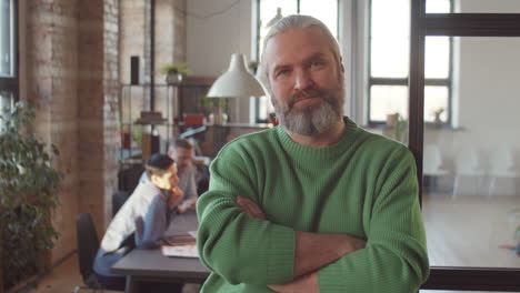 portrait of a confident man in an office