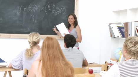 teenagers studying maths in a class