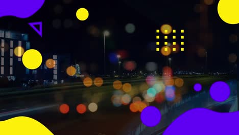 animación de círculos coloridos que se mueven sobre el paisaje urbano nocturno borroso