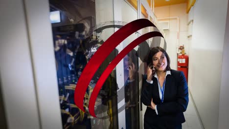 Animation-of-circles-and-globe-over-biracial-female-worker-talking-on-smartphone-next-to-server-room