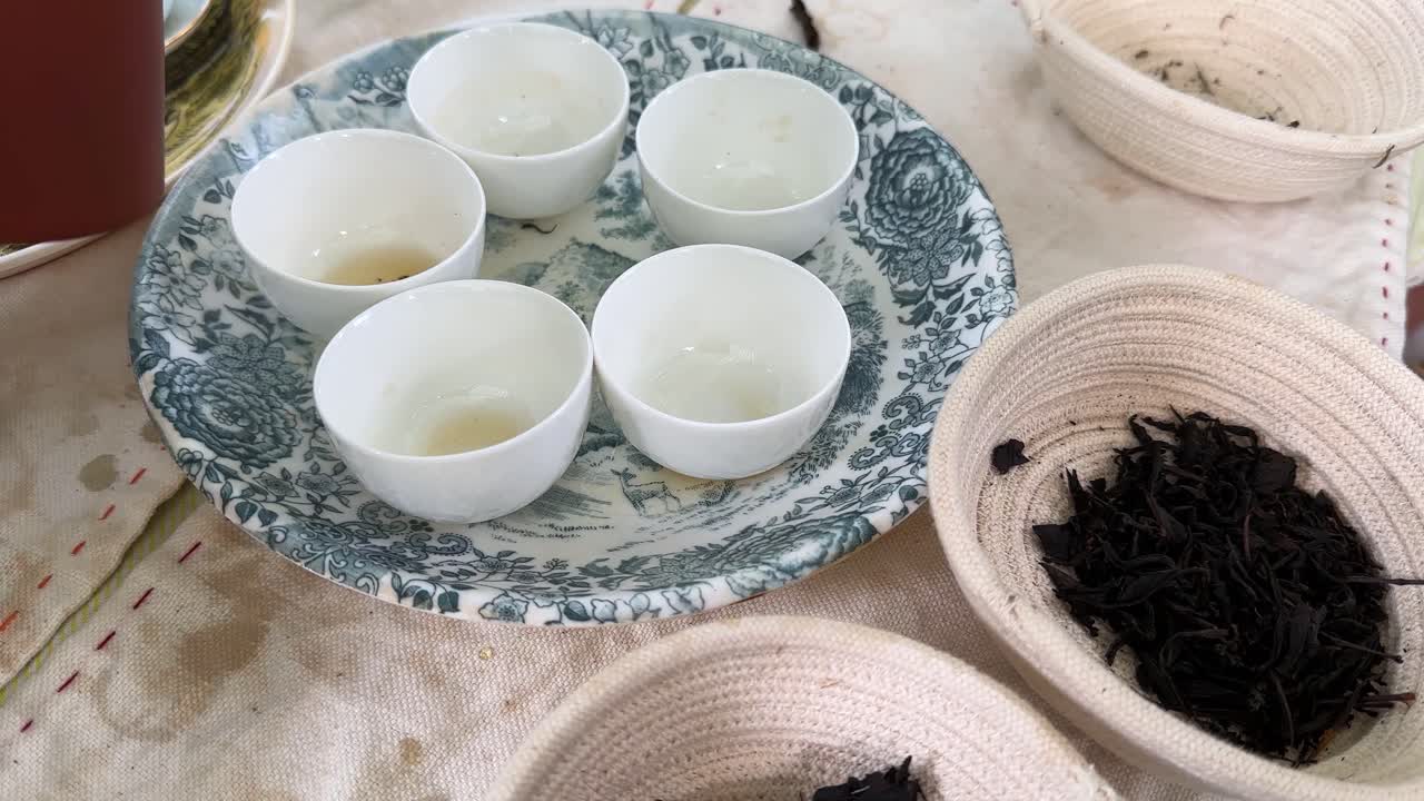 Tea experience resort relaxing peaceful gathering family friends travel leisure traditional aromatic herbal healthy authentic breakfast elegant pour Moroccan flavors vibrant atmosphere sunny morning