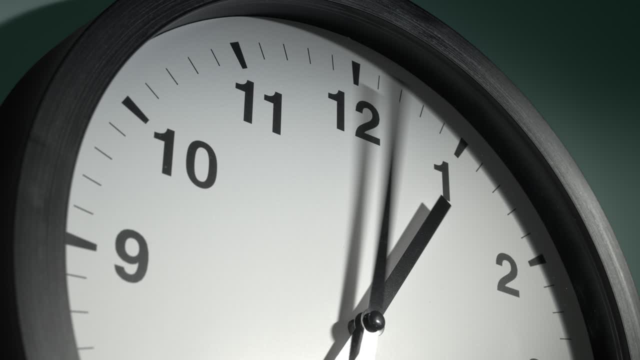 Clock Face on Dark Green Wall in Time Lapse