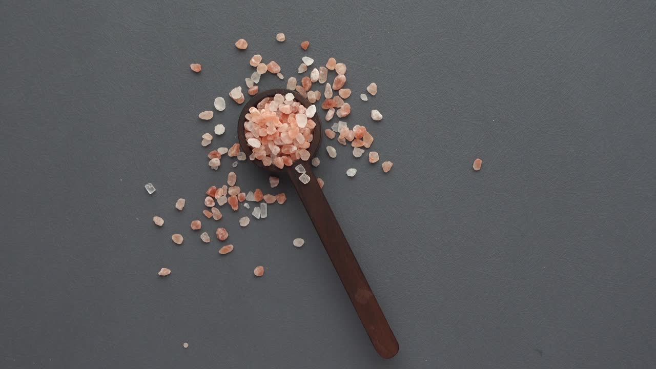 Pink Salt in Wooden Spoon