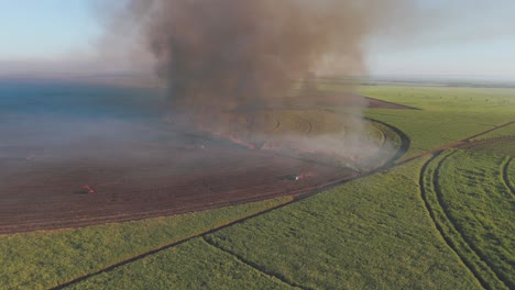 a slow aerial spin of a controlled fire that releases a lot of smoke