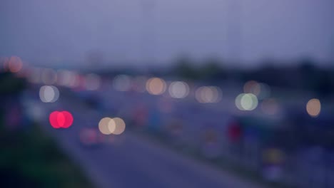 footage motion blurred of bokeh light with transport car on express way road.