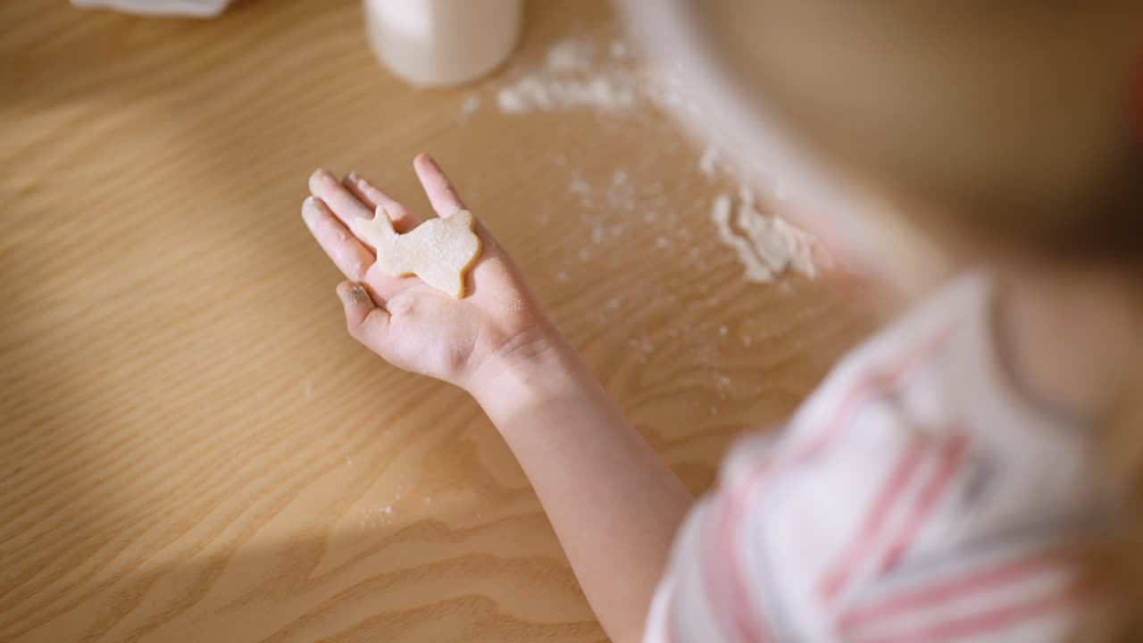 Child making cookies