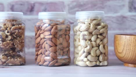 assortment of nuts in clear containers