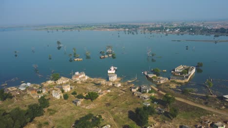 Aerial-drone-shot-of-a-flooded-village-in-India
