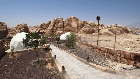 bedouin camp, accommodation in petra archaeological site, jordan, bubble tents in desert landscape