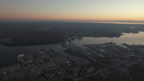aerial wide shot of second narrow bridge in vancouver from north shore, dusk