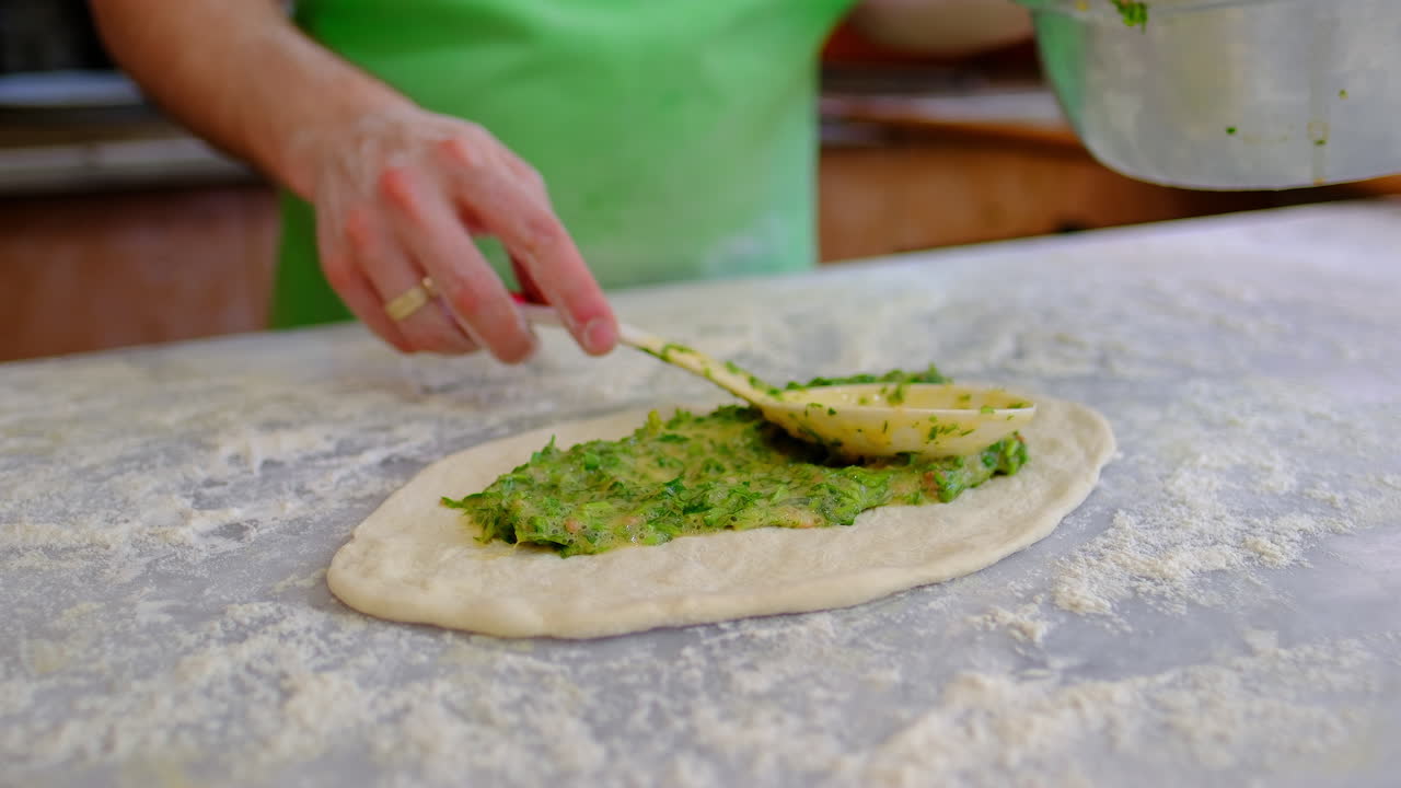chef is preparing pita slow motion