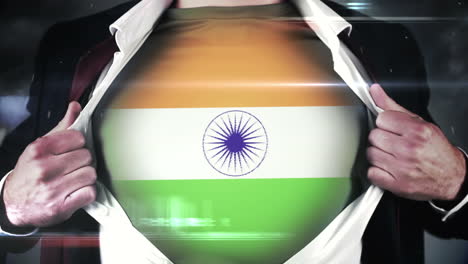 businessman opening shirt to reveal indian flag