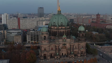 Aerial-view-of-Berlin-cathedral-at-dusk.-Historic-religious-landmark-and-point-of-interest-for-tourists.-Berlin,-Germany