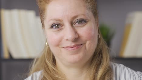 close-up portrait of smiling mature woman.