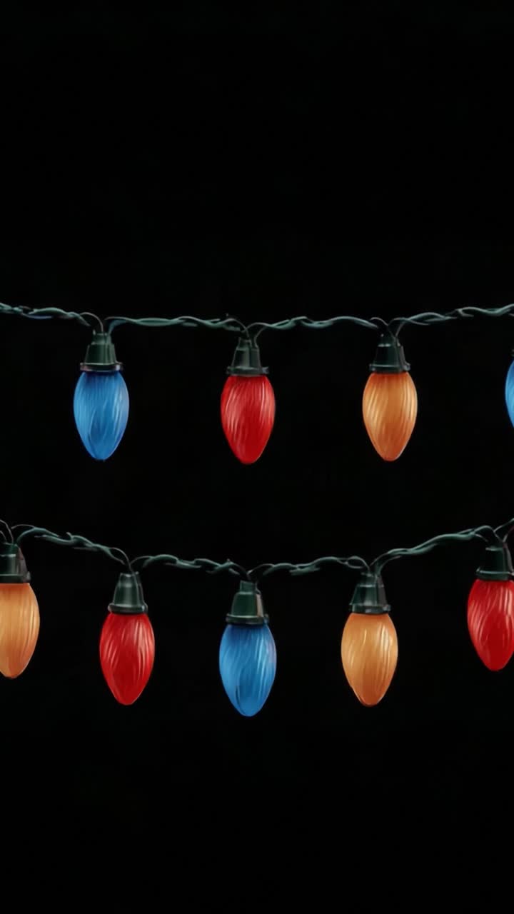 A Vibrant Display of Colorful Christmas Lights Hanging Against a Dark Background, Showcasing a Festive Atmosphere Perfect for Holiday Celebrations and Decor