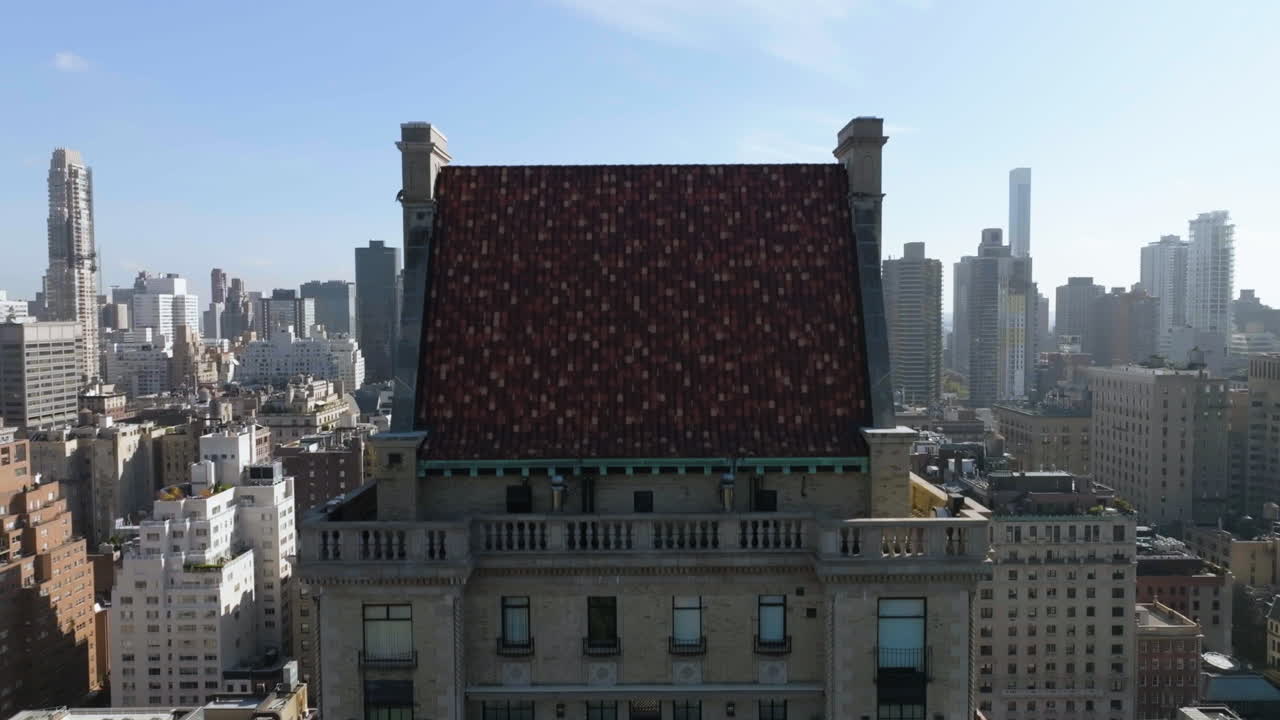 Aerial view ascending in front of a condo, revealing the Lenox hill skyline, NY
