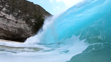 Extreme-Slow-Motion-shot-of-being-inside-the-barrel-of-a-large-wave-at-KelingKing-Beach,-on-the-island-of-Nusa-Penida,-Bali,-Indonesia