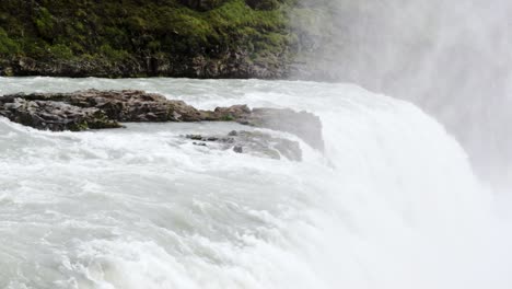 close up shot of the gullfoss falls in iceland during a summer day