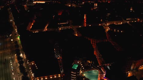 Malaga-City-At-Night-In-Andalusia,-Spain---Aerial-Drone-Shot