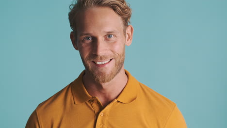 Handsome-bearded-guy-smiling-and-posing