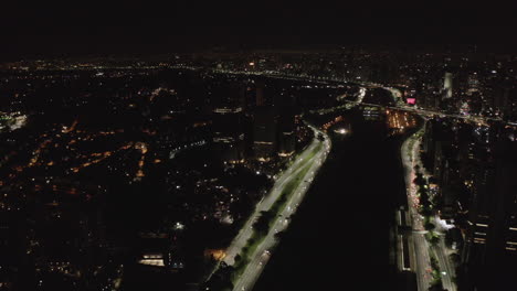drone shot of the city of sao paulo in brazil by night.