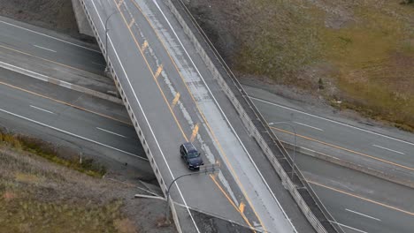 A-Bird's-Eye-View-of-the-Meadow-Creek-Rd-Bridge-Over-Coquihalla-Highway-Near-Kamloops:-Autumn-Traffic