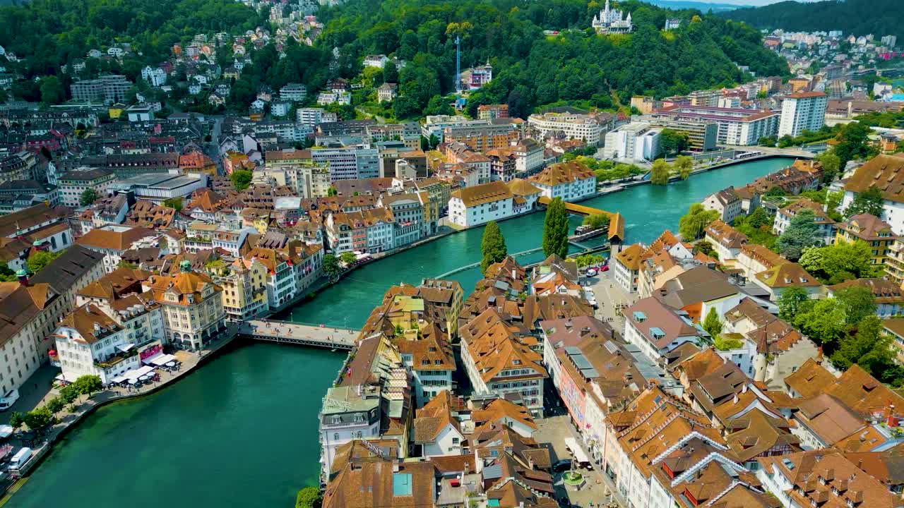 4K Drone Video of the Spreuerbrücke Bridge and Lucerne Needle Dam on the Reuss River near Lake Luzerne in Lucerne, Switzerland