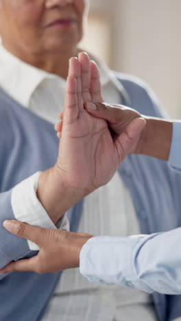 a close-up of a woman holding an elderly woman's hand. this image represents care, comfort, and support.