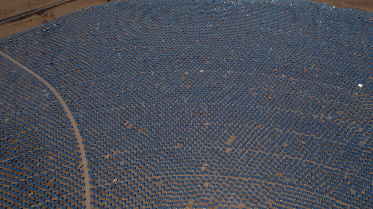 Field of mirrors spanning an area of 260 hectares and following the sun's movement to direct the light to the top of a solar tower - Ashalim power station, Israel