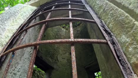 old medieval stone castle rusted iron bars covering open window for security
