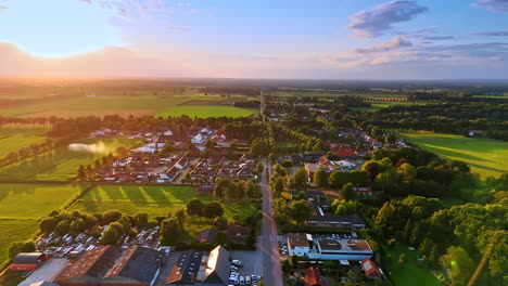 stunning scenery of a beautiful picturesque rural area. drone footage above the countryside with lush greenery at sunset