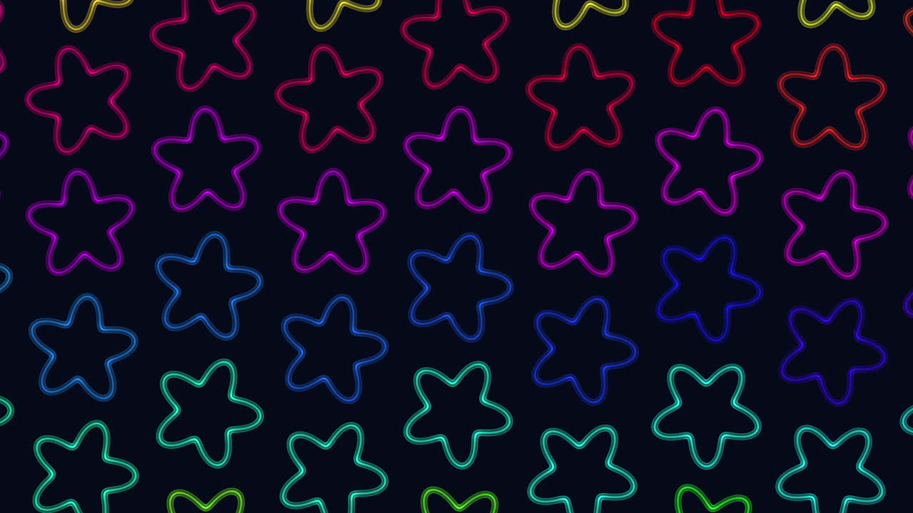 patrón de estrellas coloridas en un fondo negro arreglo simétrico de estrellas rojas, azules y verdes