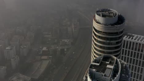 foggy cityscape with construction and traffic