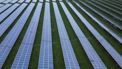 solar panels in a solar park, pan-down