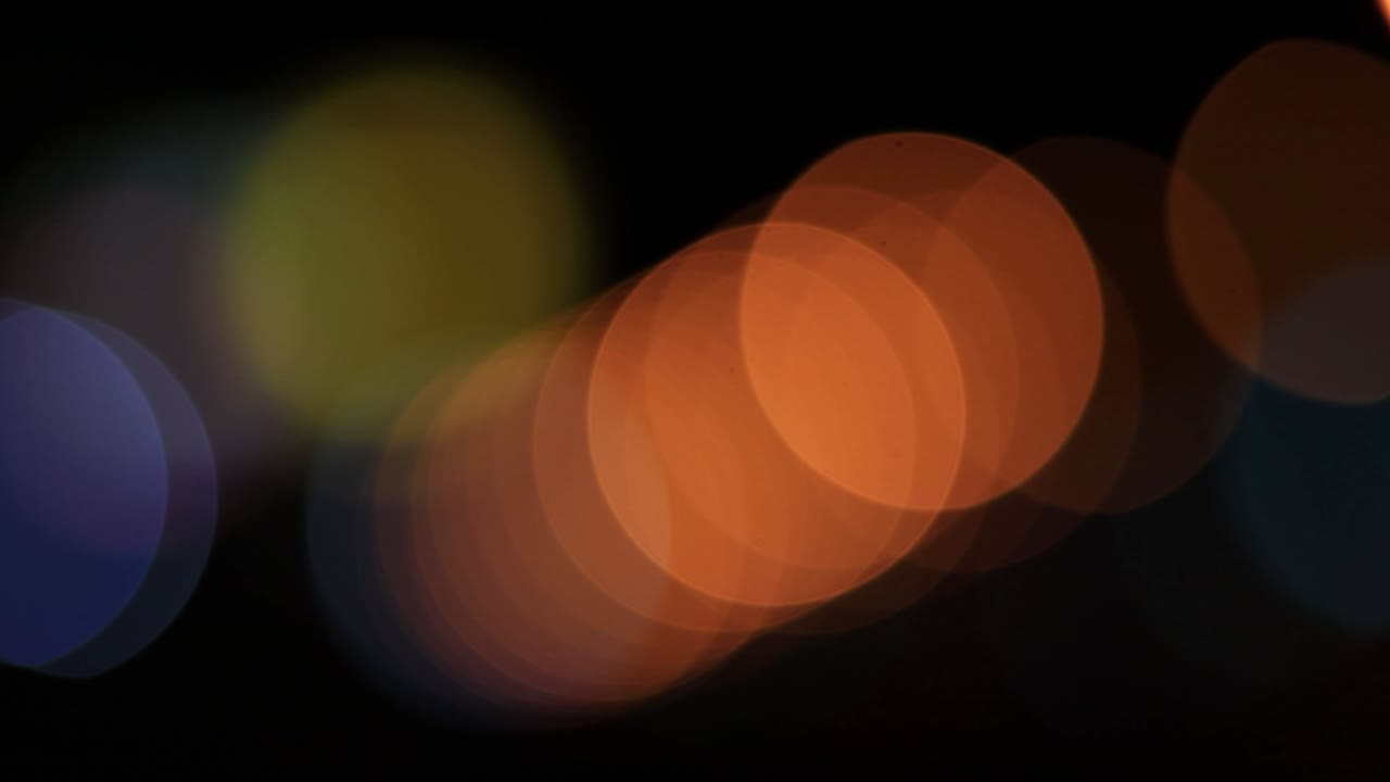 Bokeh lights in the night background, abstract backgrounds, bokeh background