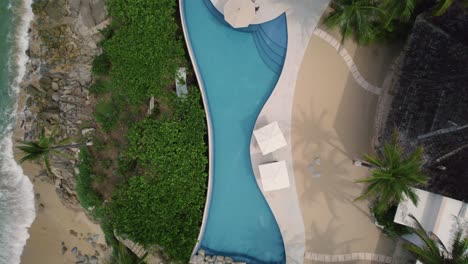 fixed bird-eye aerial over coastline in huatulco, mexico