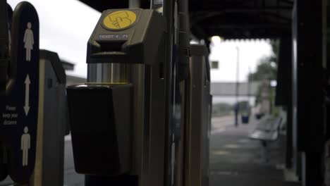 ticket machine in train station close up tilting shot