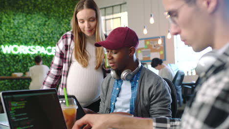 pregnant woman, laptop coding