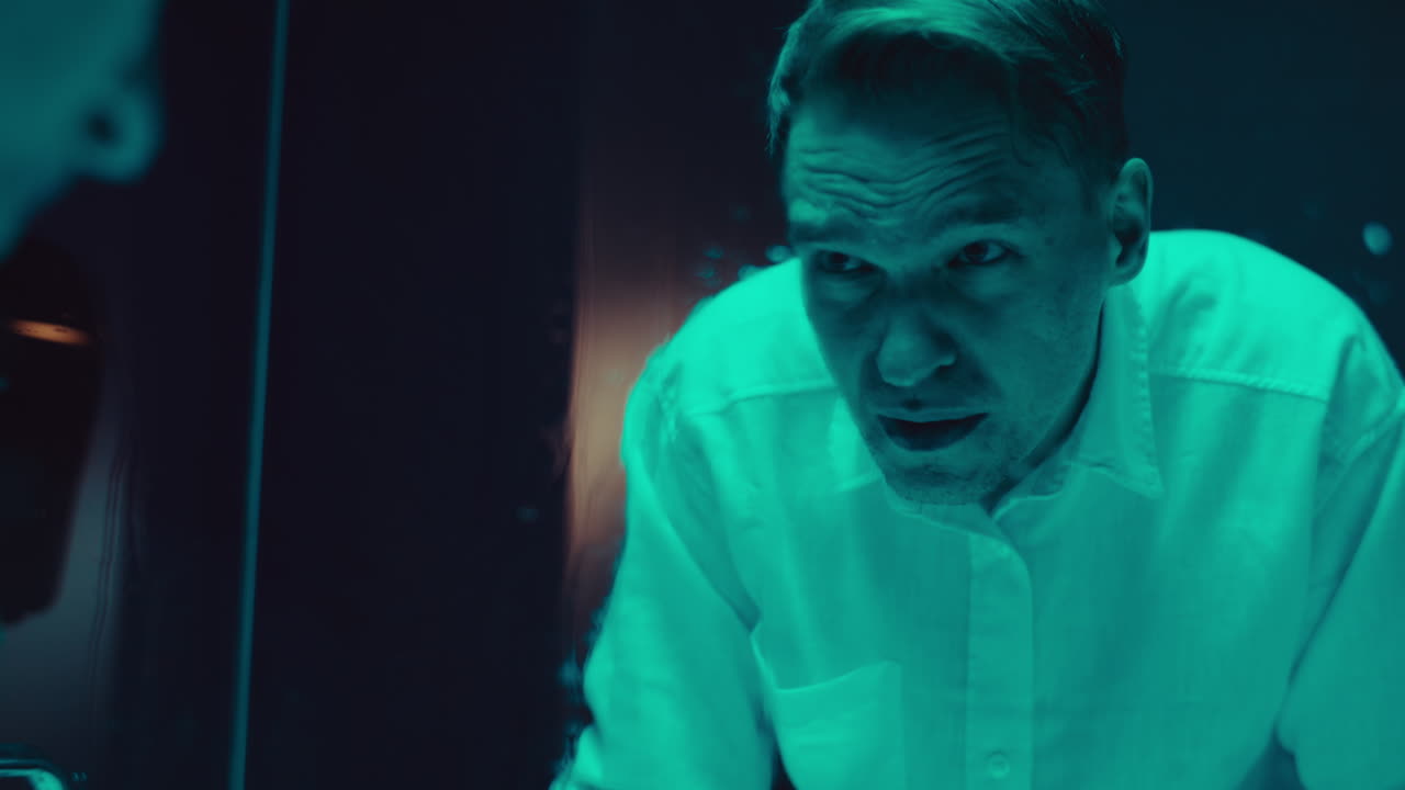 Man Looking in Mirror - Night