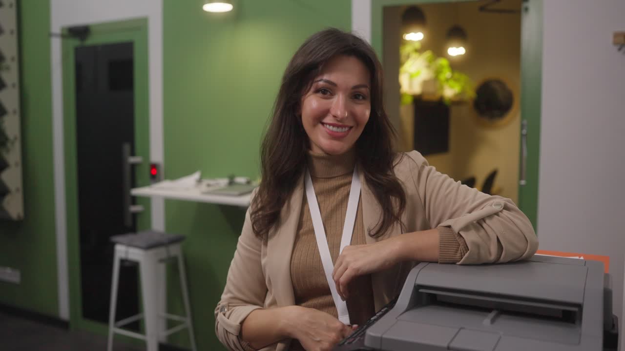Woman in office with printer