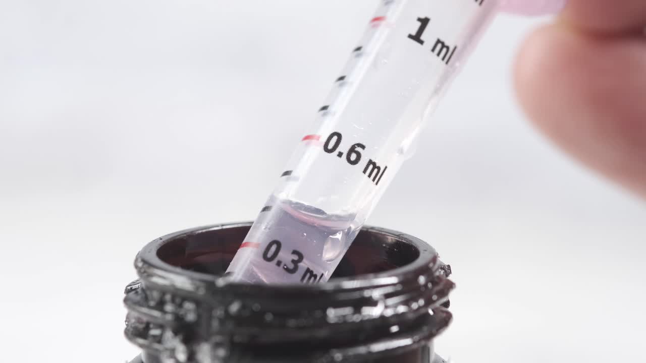 jeringuilla para transferir líquido al frasco