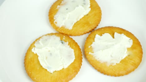 round crackers with herb cheese