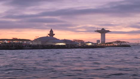 sunset view of a mosque on the water in istanbul, turkey