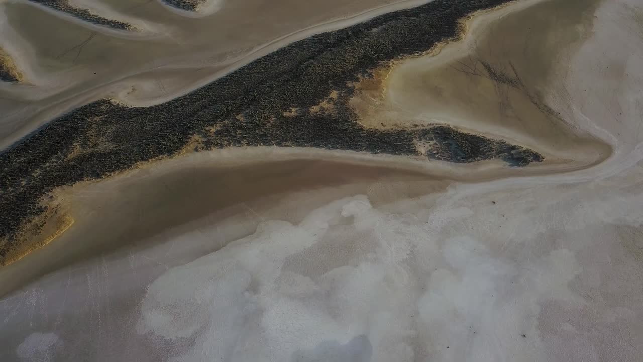 Lake Tyrrell white and pink salt lake, drone reveal shot, Victoria, Australia